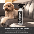 Load image into Gallery viewer, Play Date detangling spray bottle on couch with doodle in background, caption highlights no-rinse salon-quality results